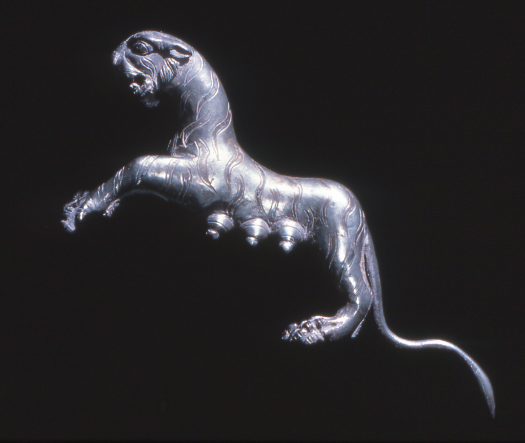 Image shows a stylised silver tigress
