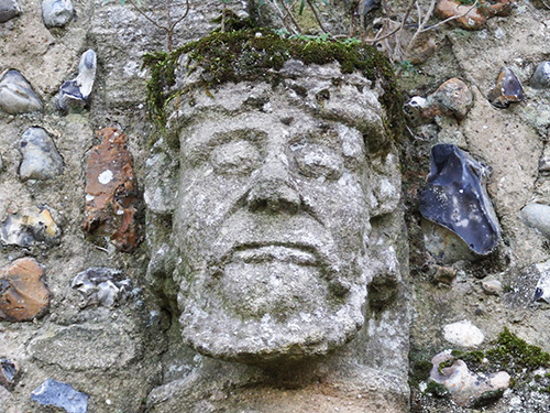 Photograph of king head carved in the stone