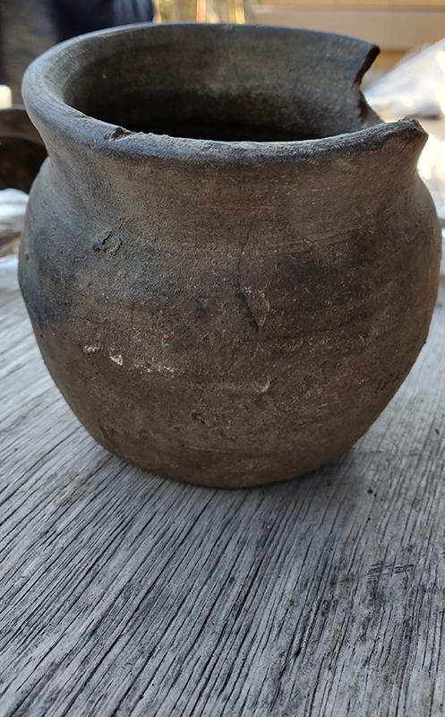 grey pot on table